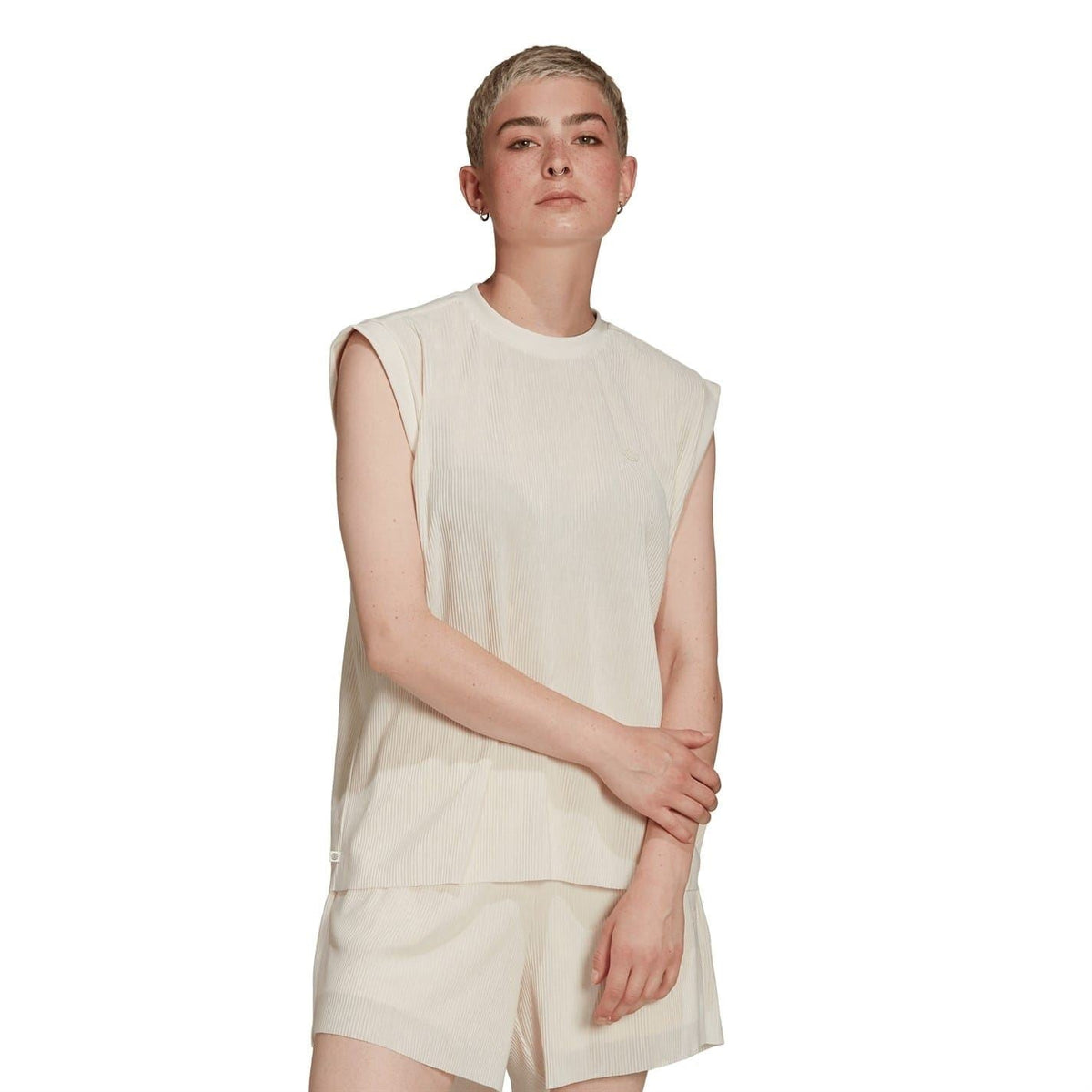 Cream crew-neck relaxed-fit tank top sleeveless, worn by model
