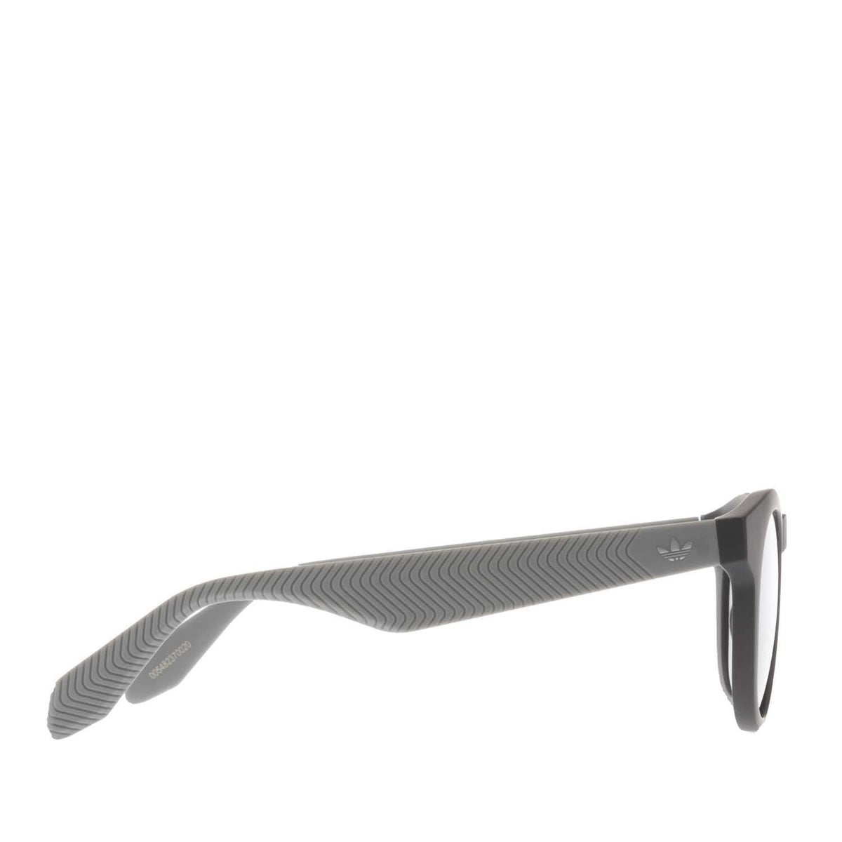adidas Originals black sunglasses with ribbed strap-style arms and side profile
