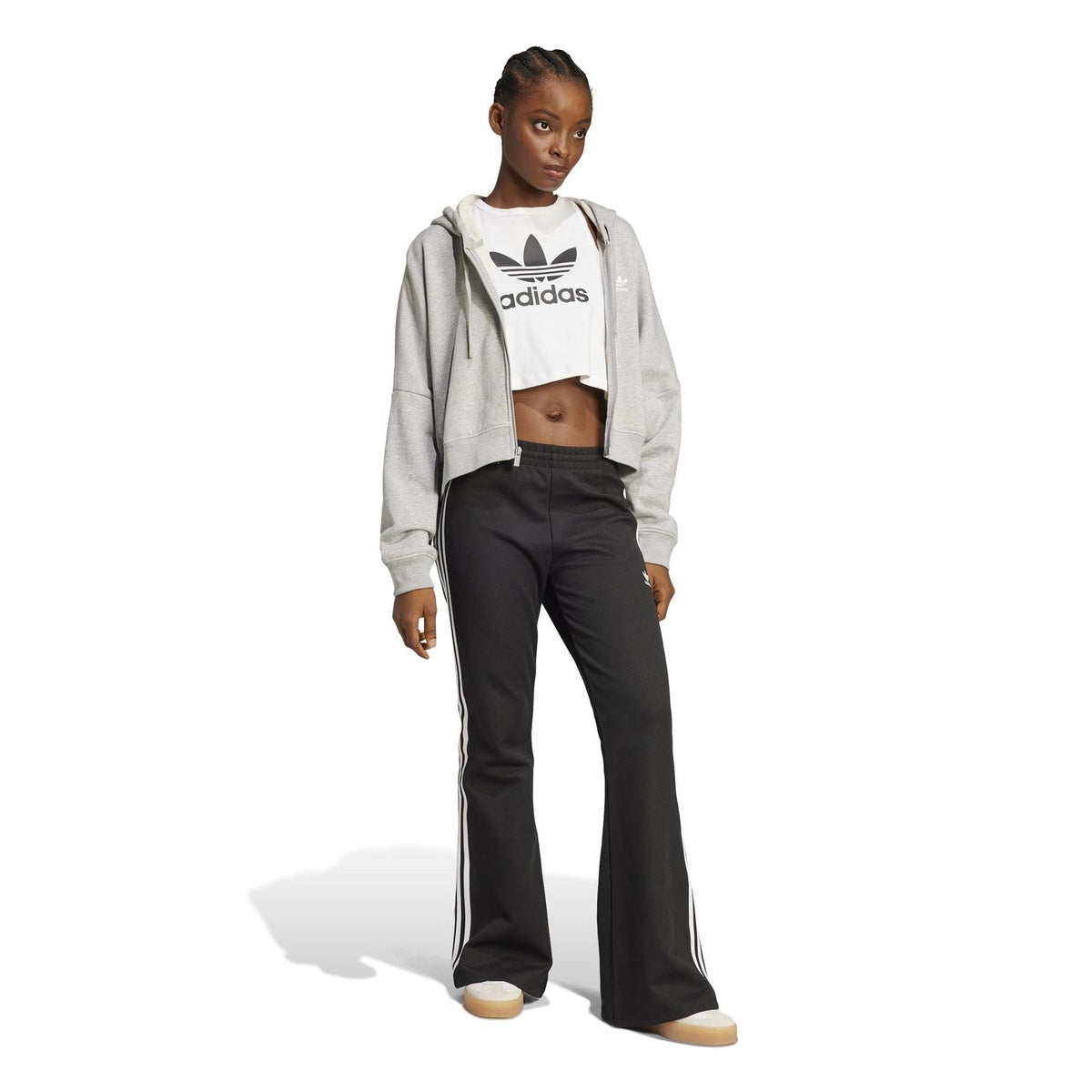 Light grey hooded zip sweatshirt worn open at the front with chest logo