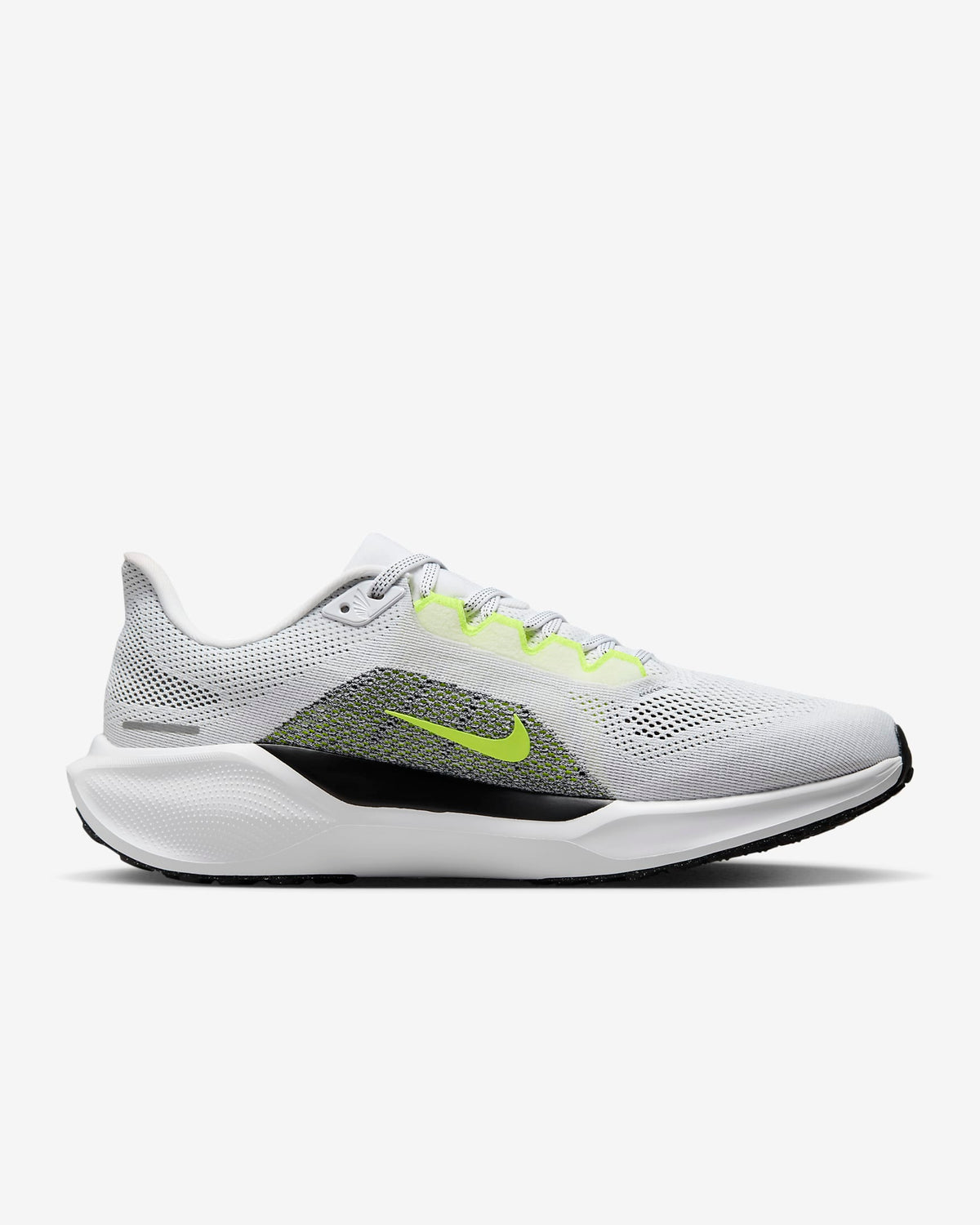 White running shoes with neon green accents and black outsole edge
