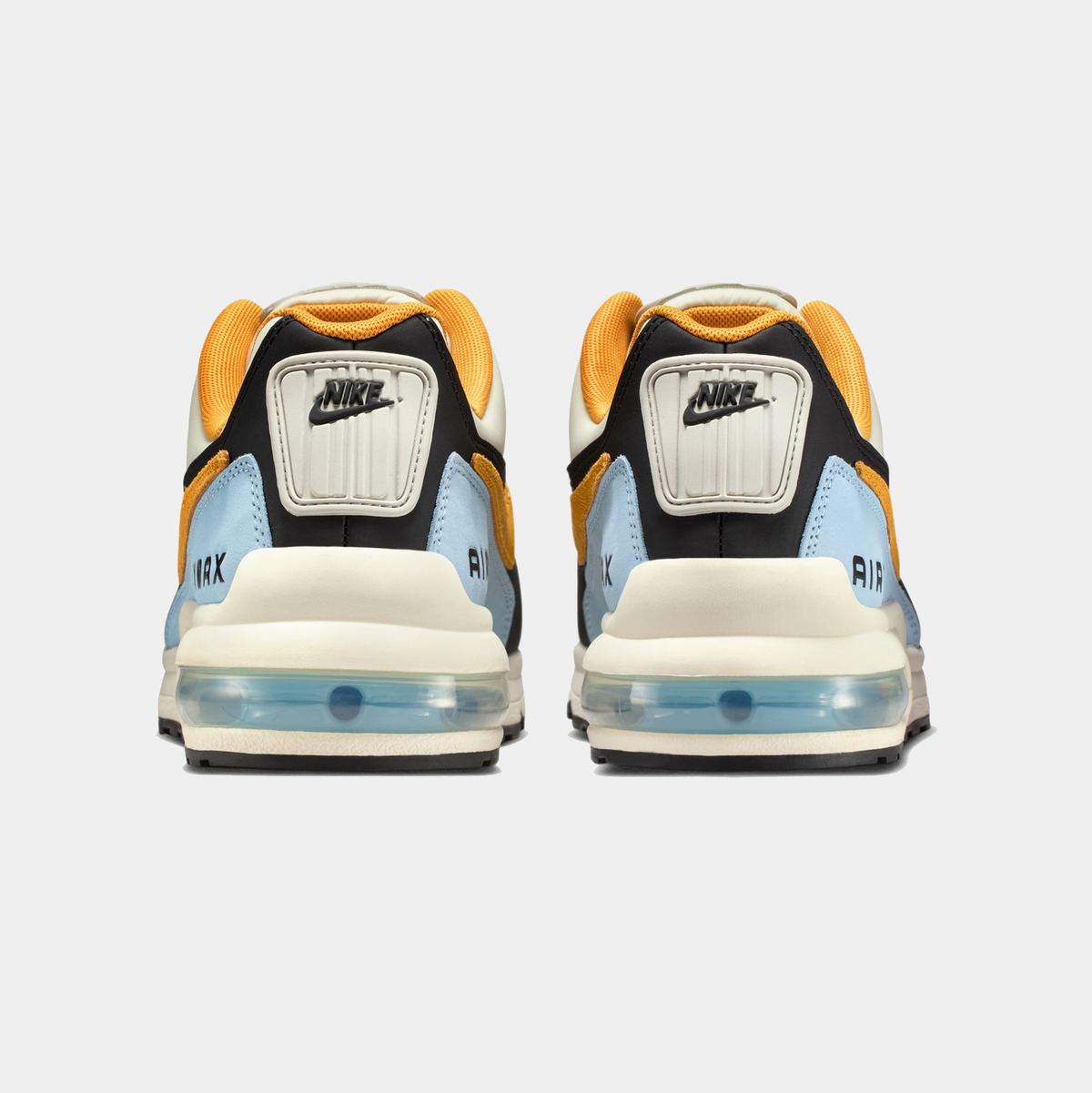Air Max LTD 3 sneakers rear view in cream, light blue, black, and orange accents