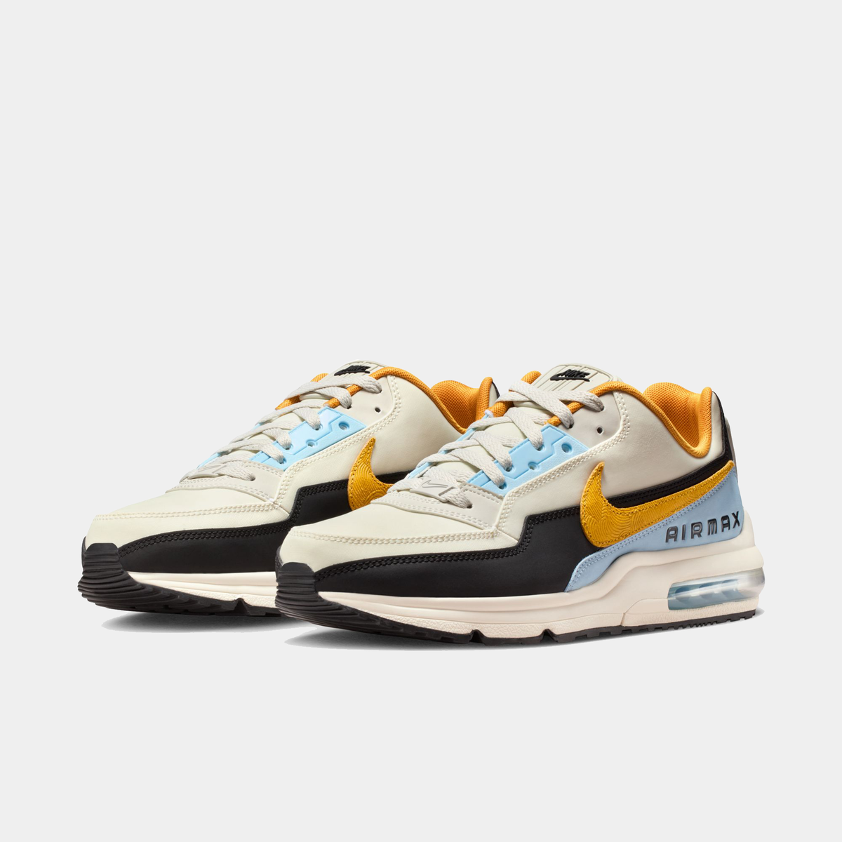 Nike Air Max LTD 3 light bone sneakers, side view with blue laces and orange swoosh