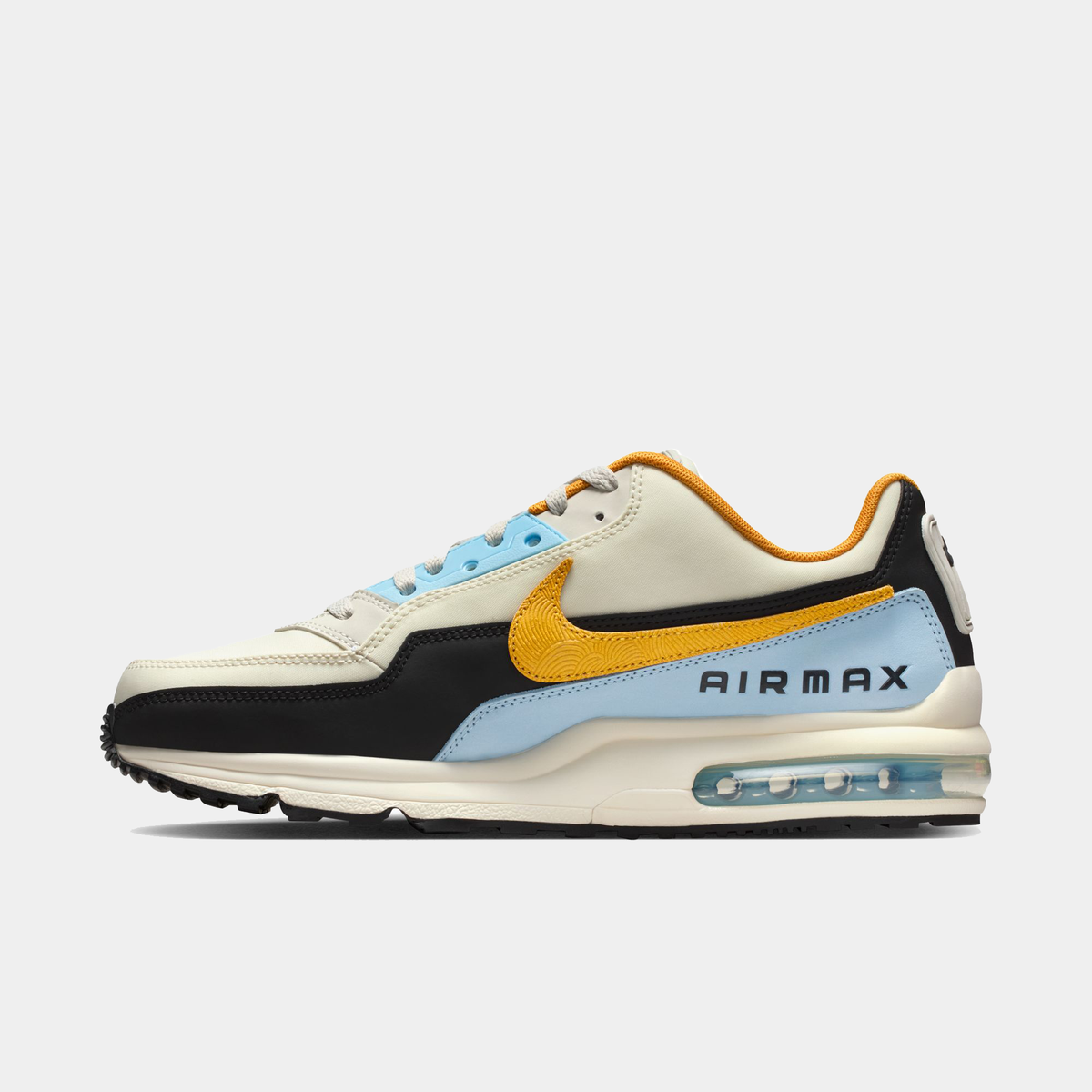 Air Max LTD 3 sneakers in cream, black, and light blue with orange and yellow accents