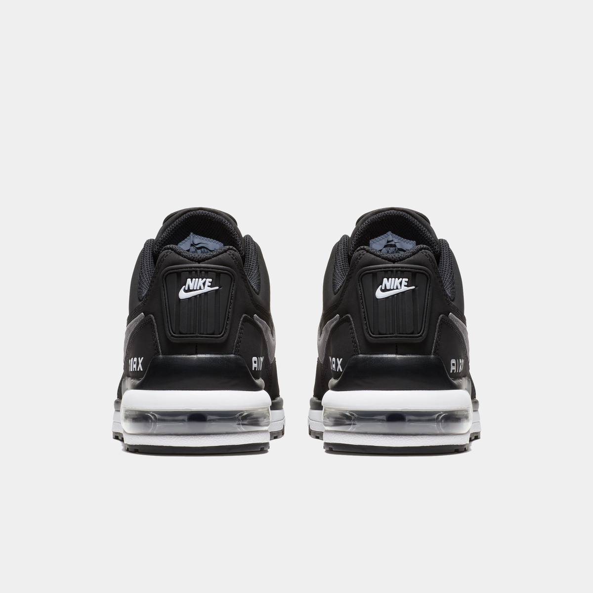 Black Nike Air Max sneakers rear view with Nike heel tag and Air unit