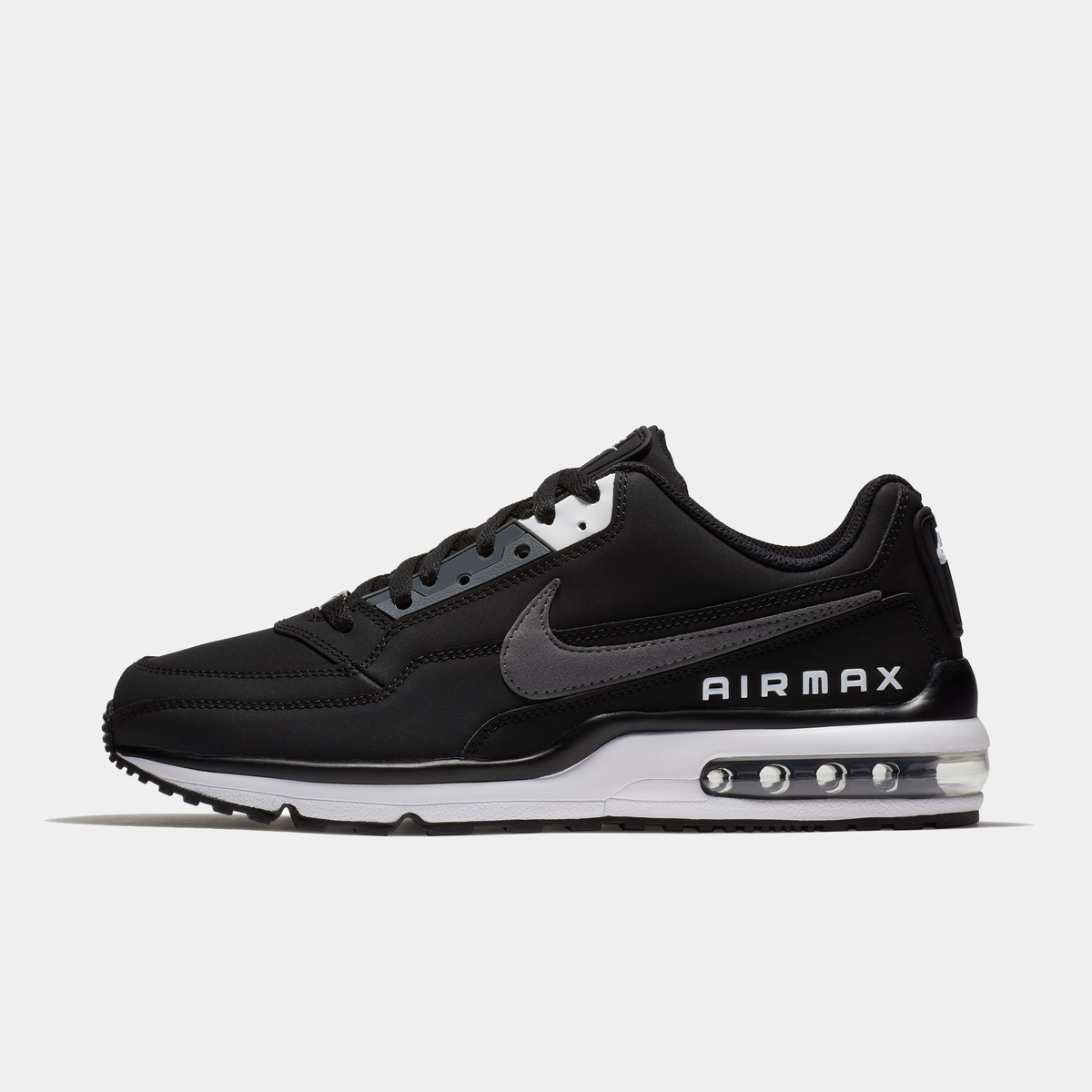 Black Nike Air Max sneakers side view with AIRMAX branding and Air unit
