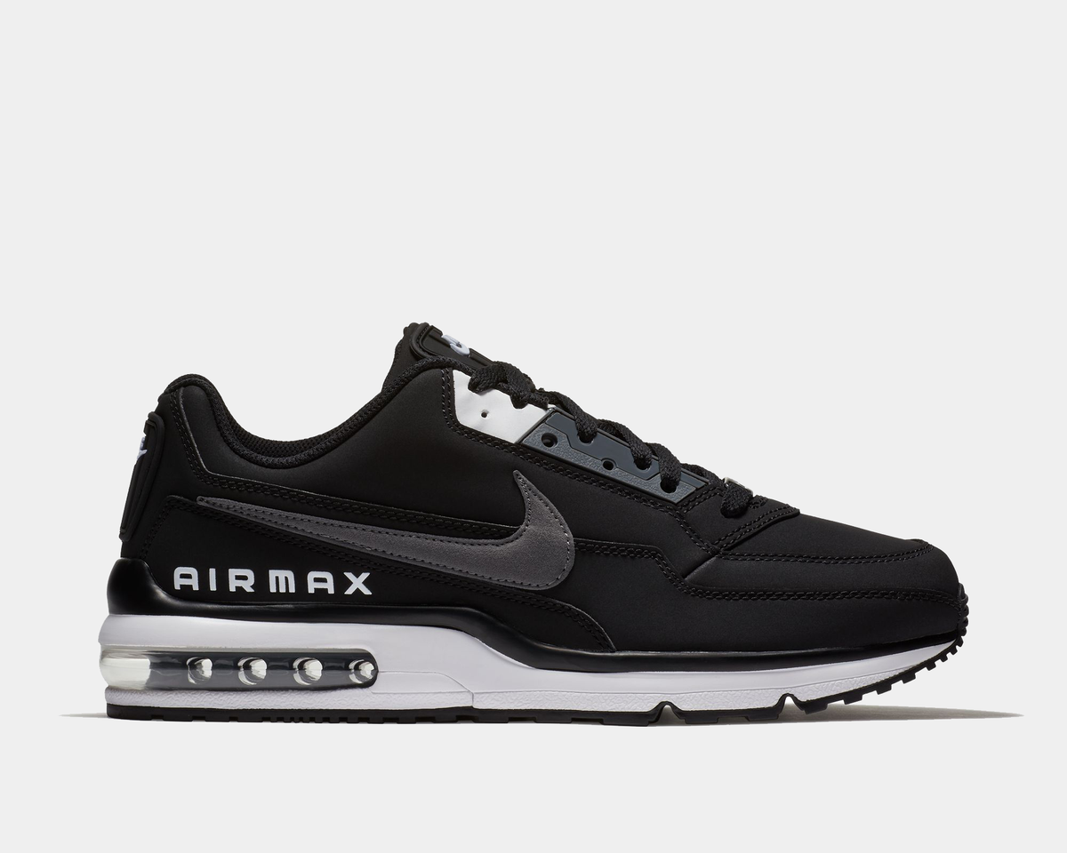 Black Nike Air Max sneakers with side Swoosh and visible Air window