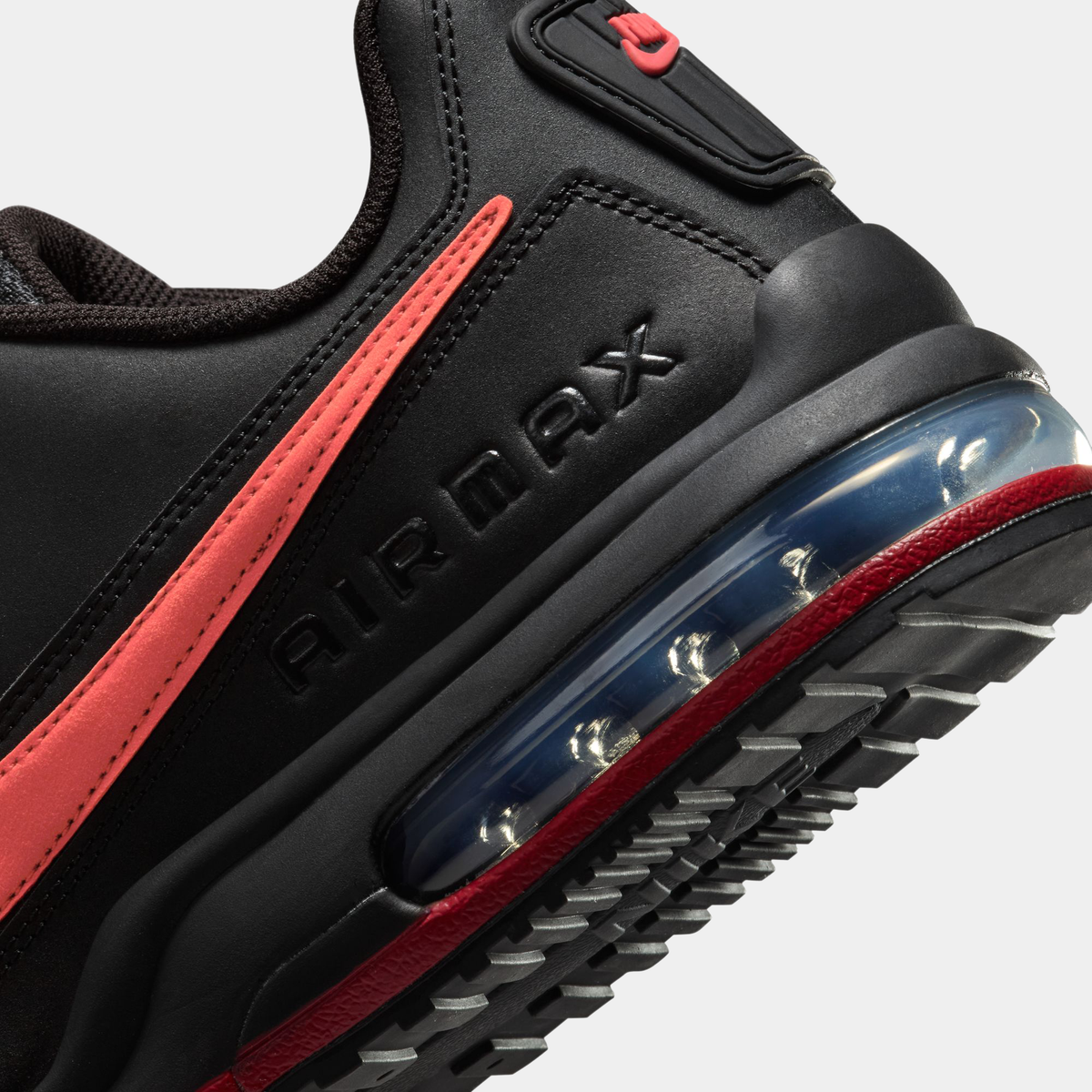 Close-up of black Air Max LTD 3 midsole with red trim and air window