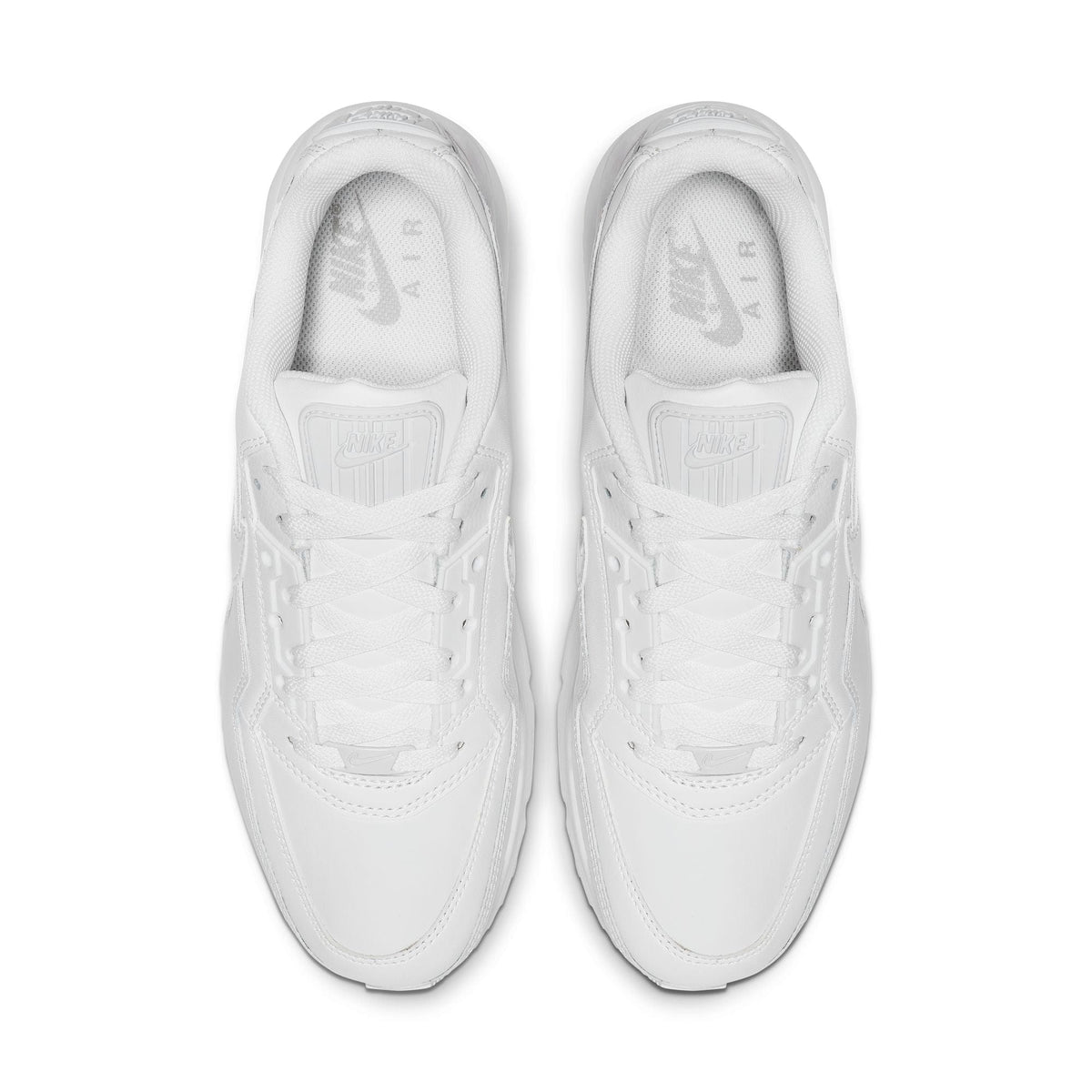 White Nike Air Max sneakers viewed from top with lace-up openings and stitching