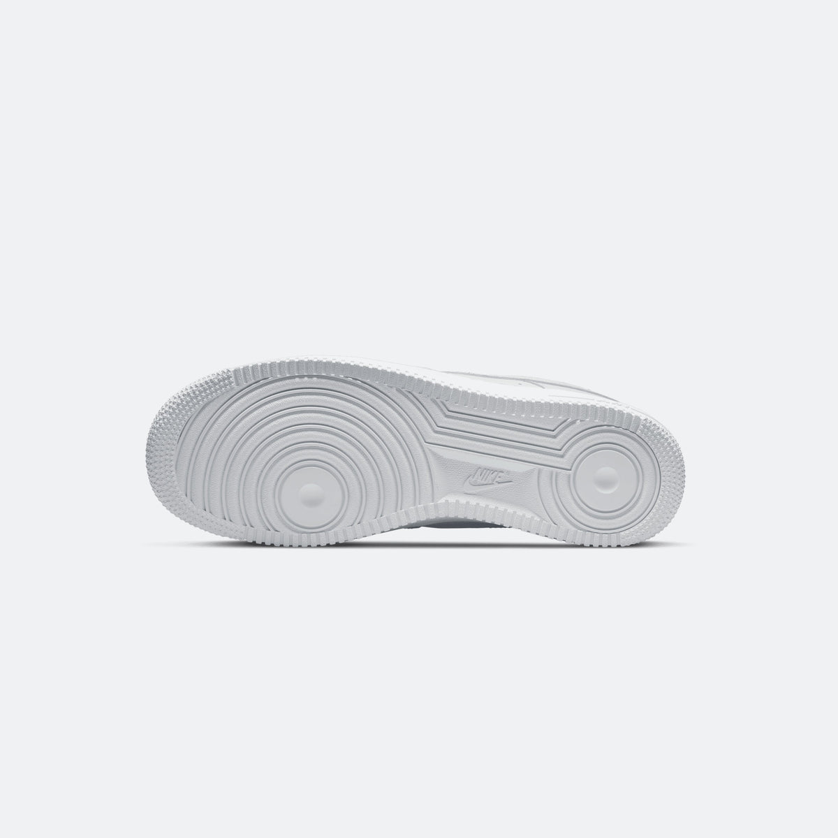 Nike Air Force 1 '07 triple white outsole view, textured rubber traction pattern