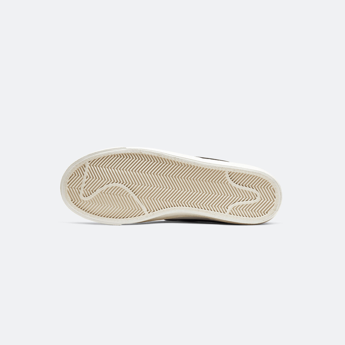 Nike Blazer Mid '77 outsole with zigzag tread and beige rubber pattern