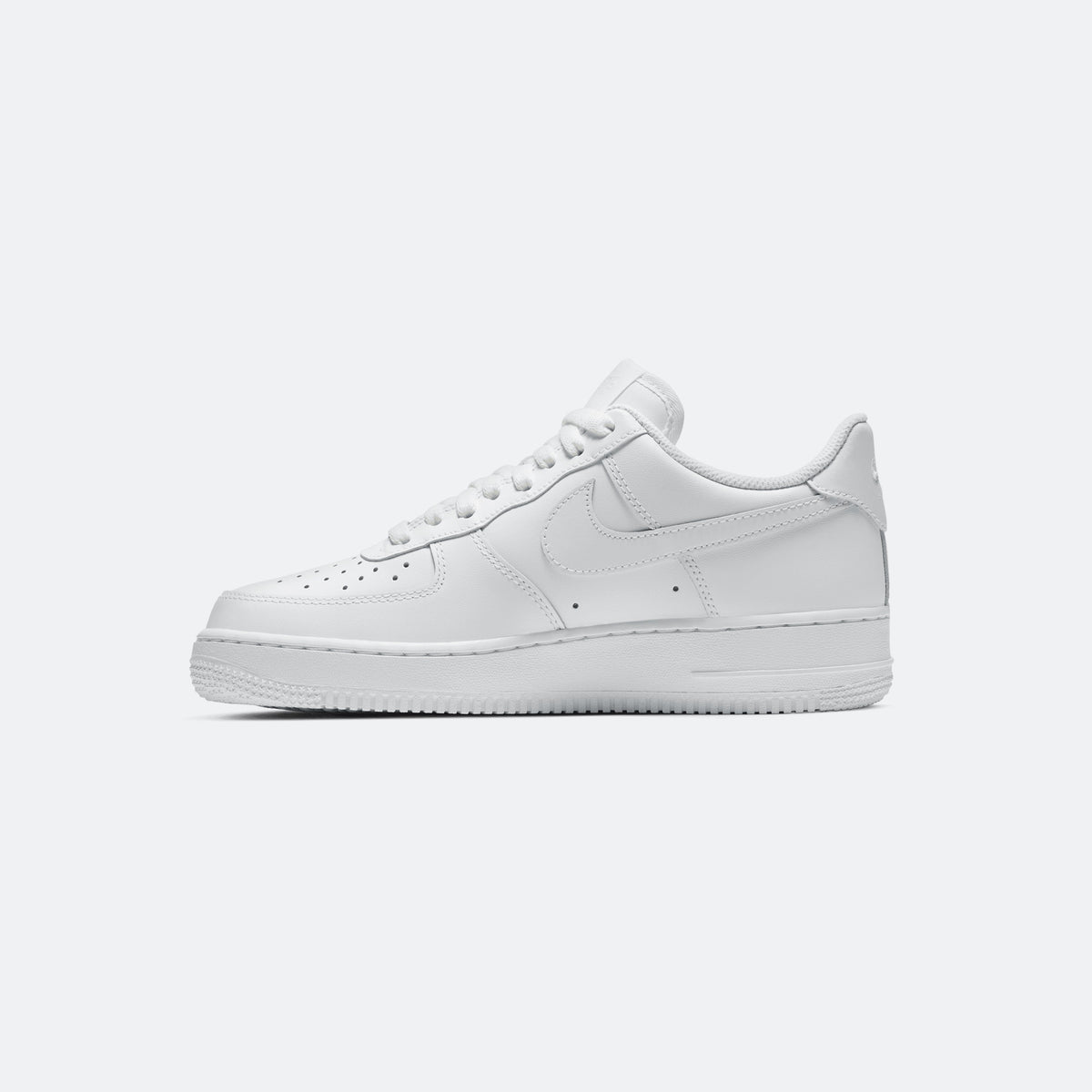 White Nike Air Force 1 low-top sneaker, lateral side view with perforations and laces