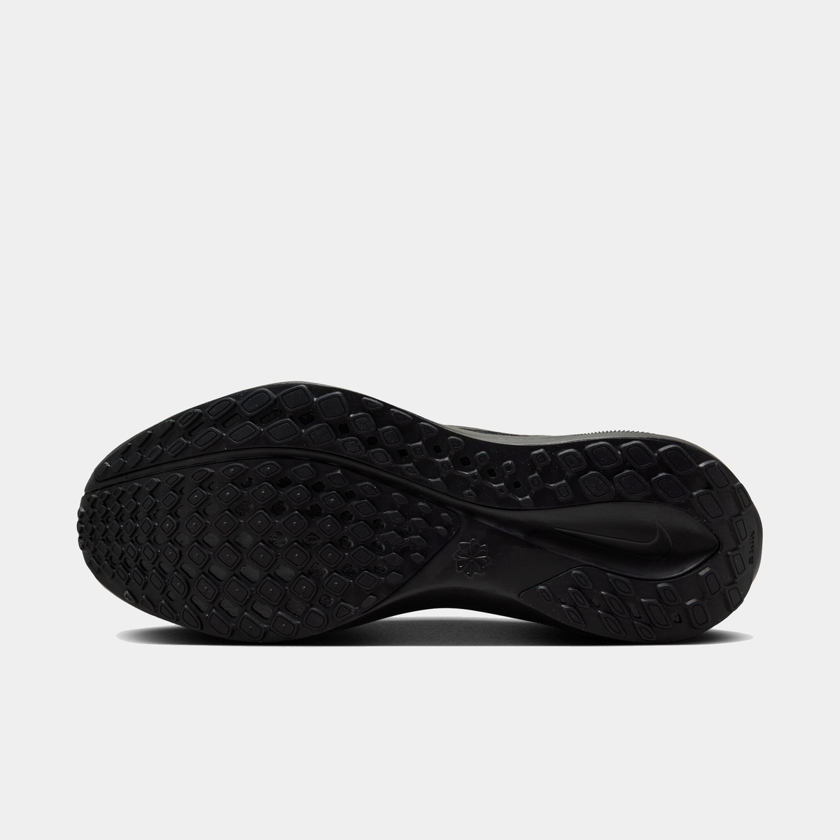 Black running shoe outsole with textured traction pattern and heel cushioning detail