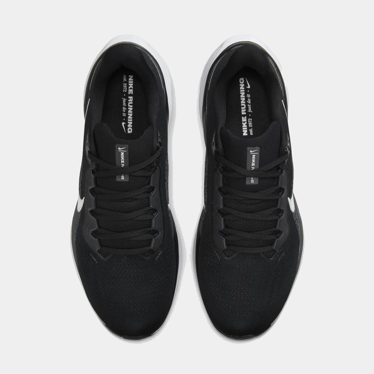 Black running shoes pair, lace-up mesh upper with Nike branding inside