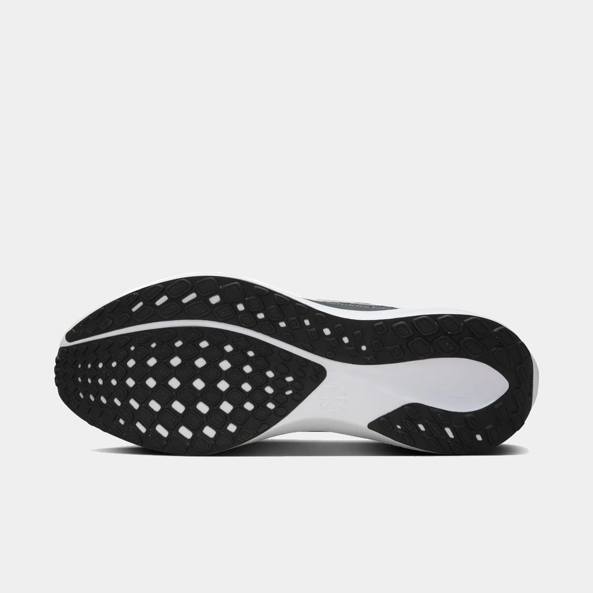 Black rubber outsole with diamond traction pattern and white foam edge