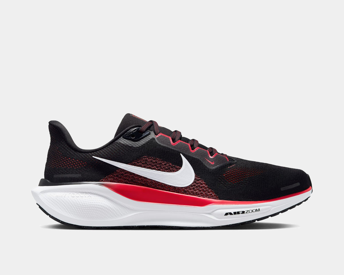 Black and red lace-up running shoe with Nike swoosh and white cushioned sole