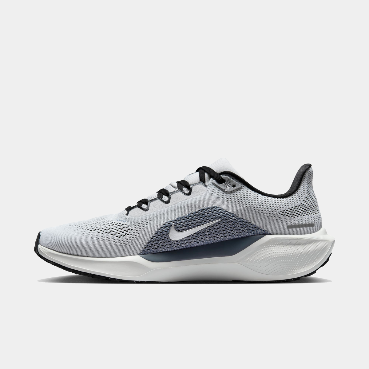 Light gray running shoe with navy side panel logo, black laces, and white rocker sole