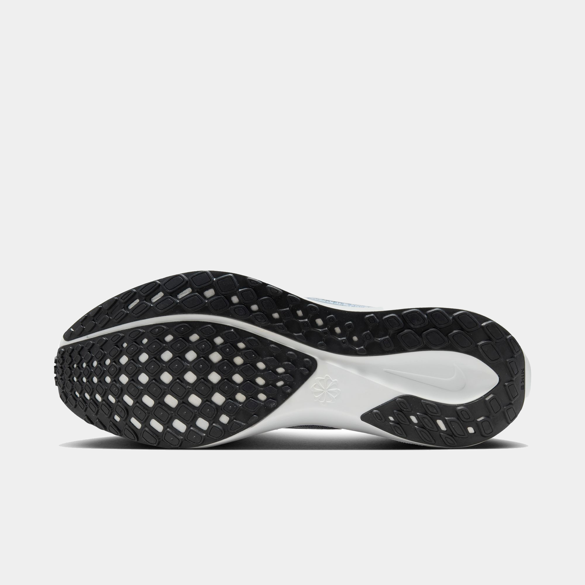 Air Zoom Pegasus 41 running shoe outsole, dark rubber tread with white midsole edge