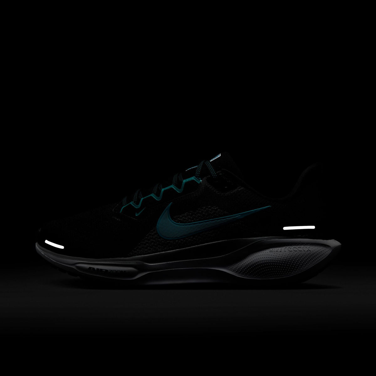 Black running shoe with teal accents, swoosh mark, and white midsole