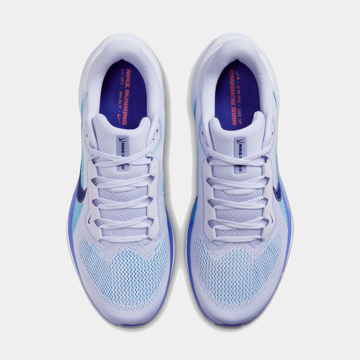 White running shoe with blue lining, lace-up front and cushioned collar