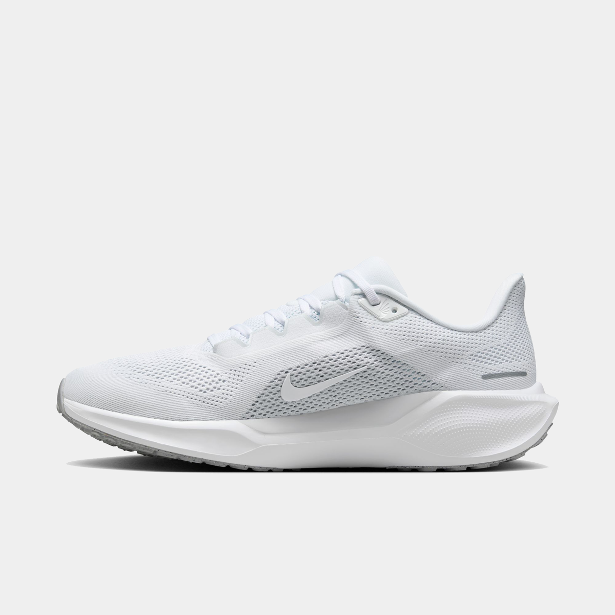 White lace-up running shoe with side swoosh logo and sculpted midsole