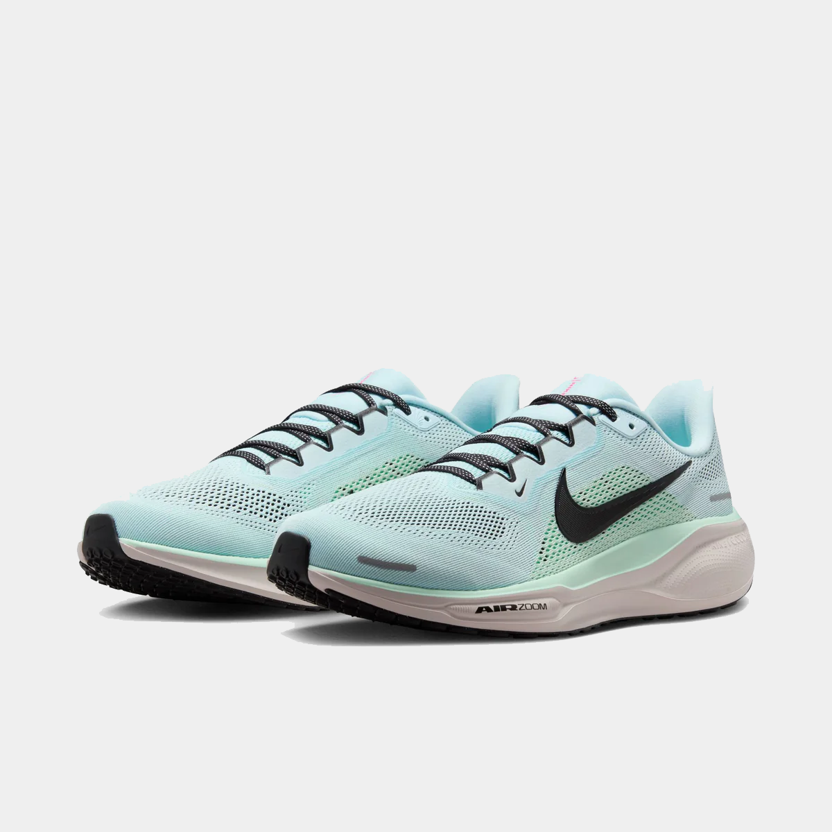 Light blue running sneakers with black laces and swoosh, white cushioning midsole