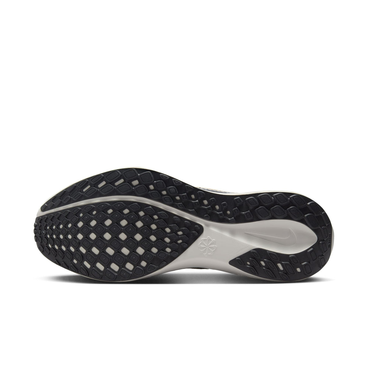 Pegasus 41 running shoes with black traction outsole and white midfoot panel.