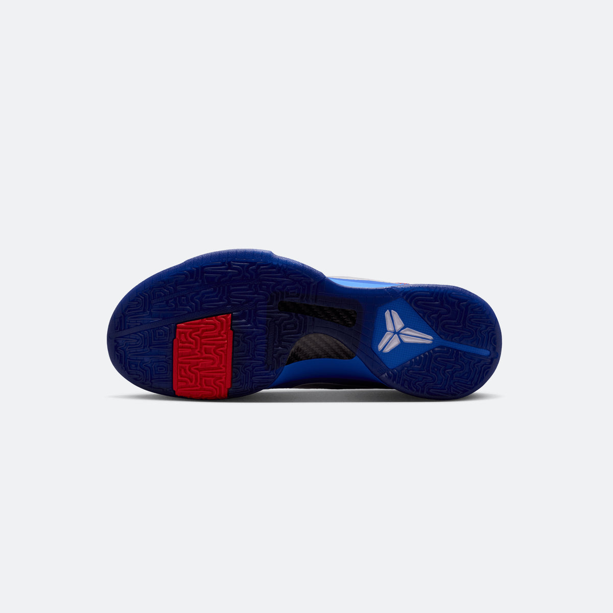 Blue Kobe V Protro outsole with geometric traction pattern and red heel section