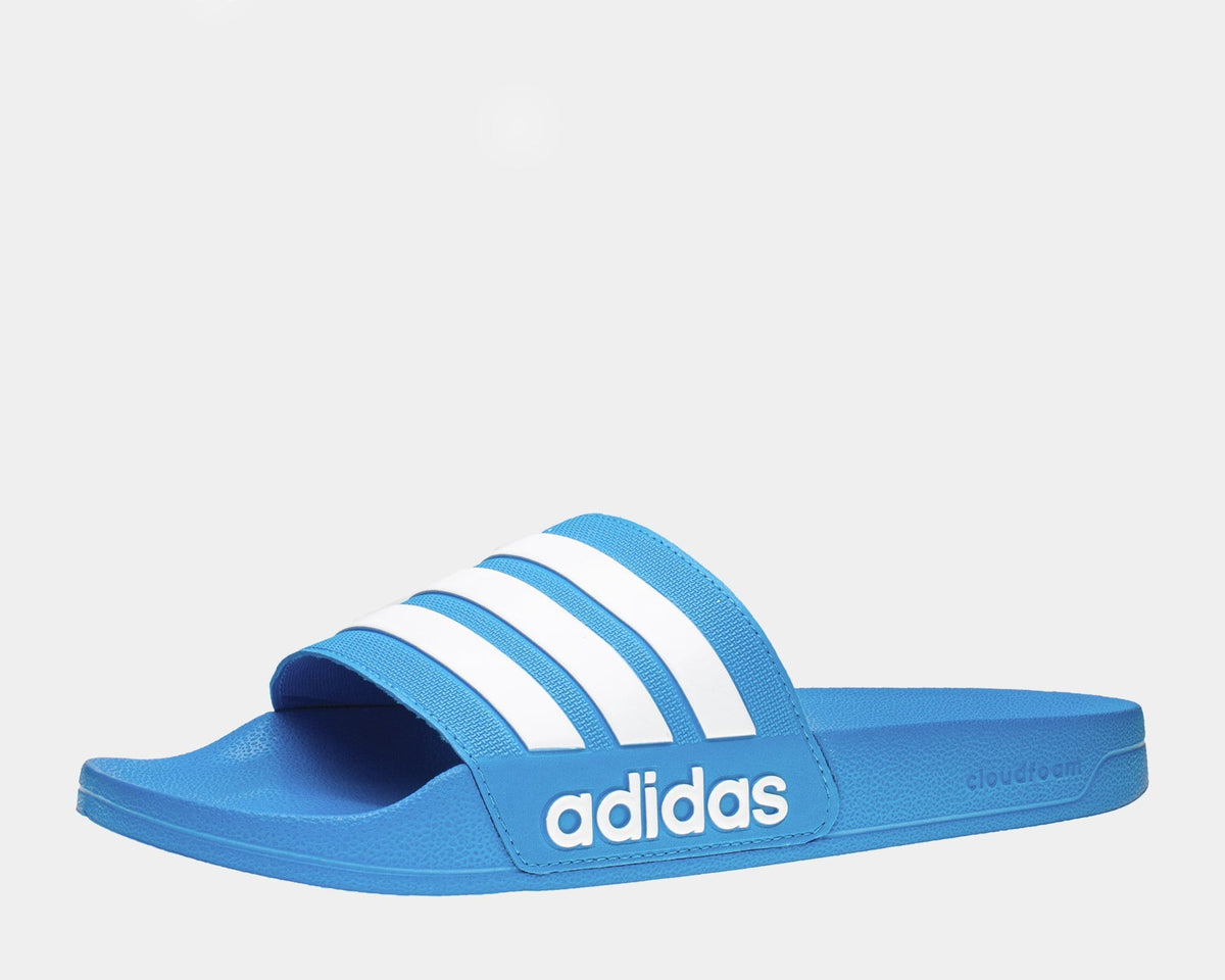 Blue Adilette shower slide sandals with white triple stripes and adidas logo