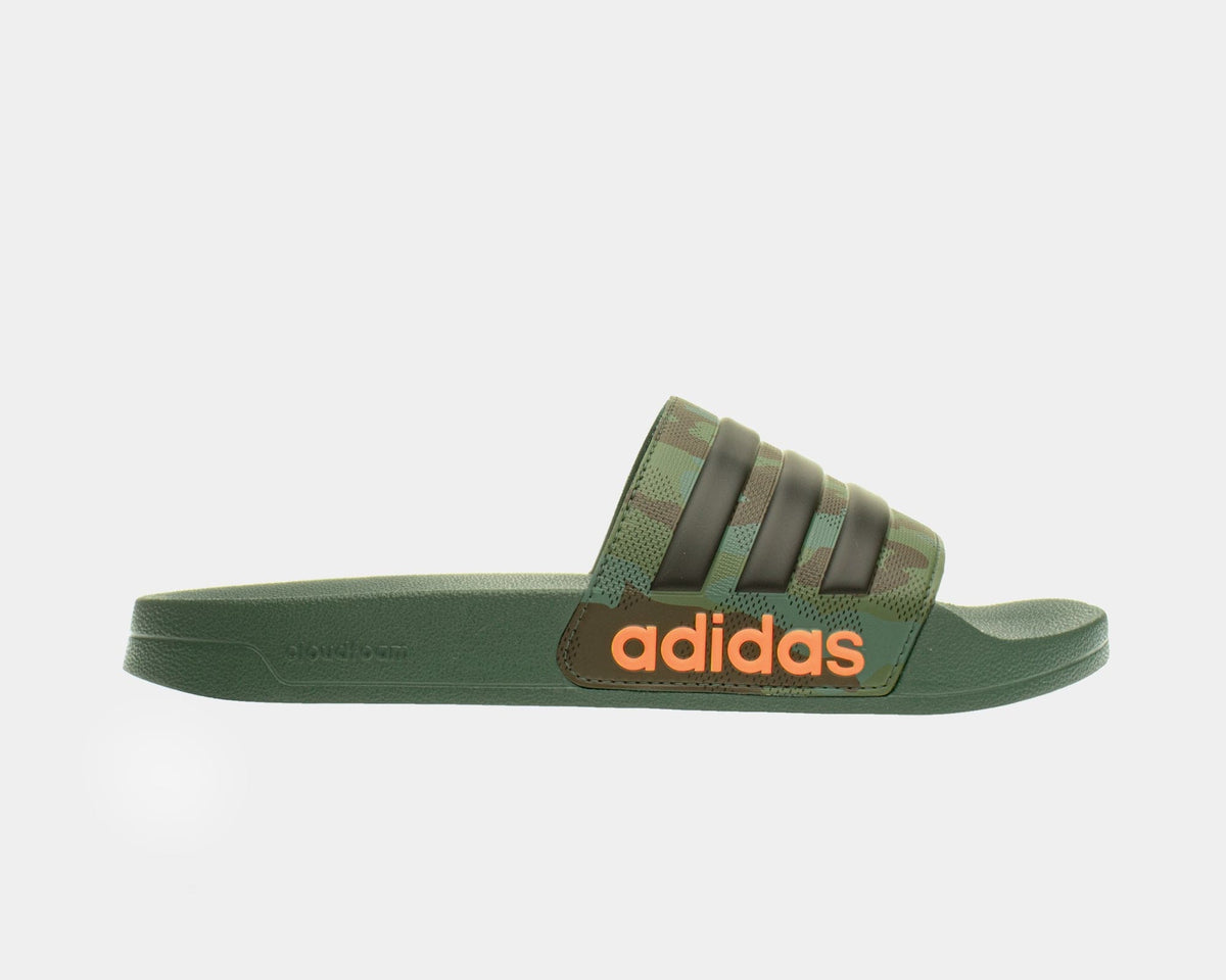 Adilette shower slides in green with adidas logo and brown three-stripe strap