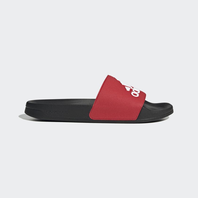 Adilette shower slides, black slide with red strap and red adidas logo