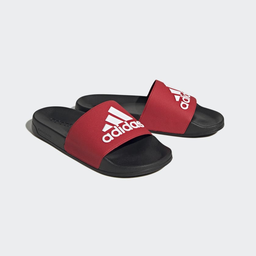 Adilette shower slides, red and black slide sandals with adidas logos on straps