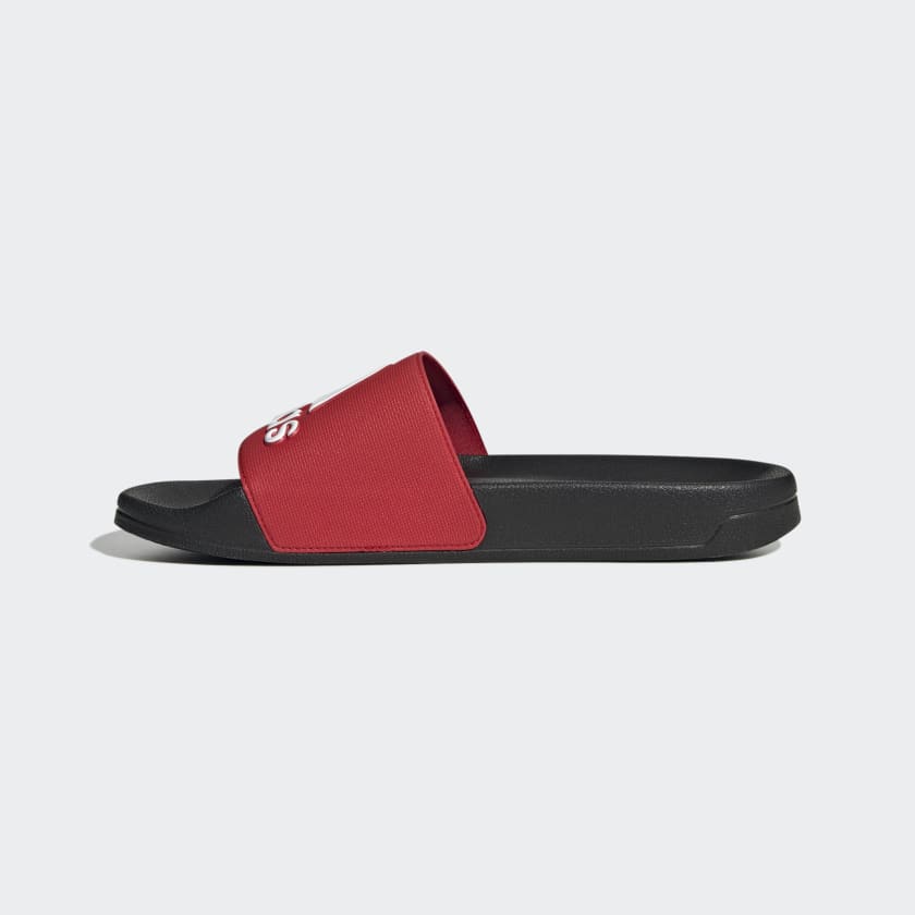 Adilette shower slides, red strap with black base and small red adidas logo mark
