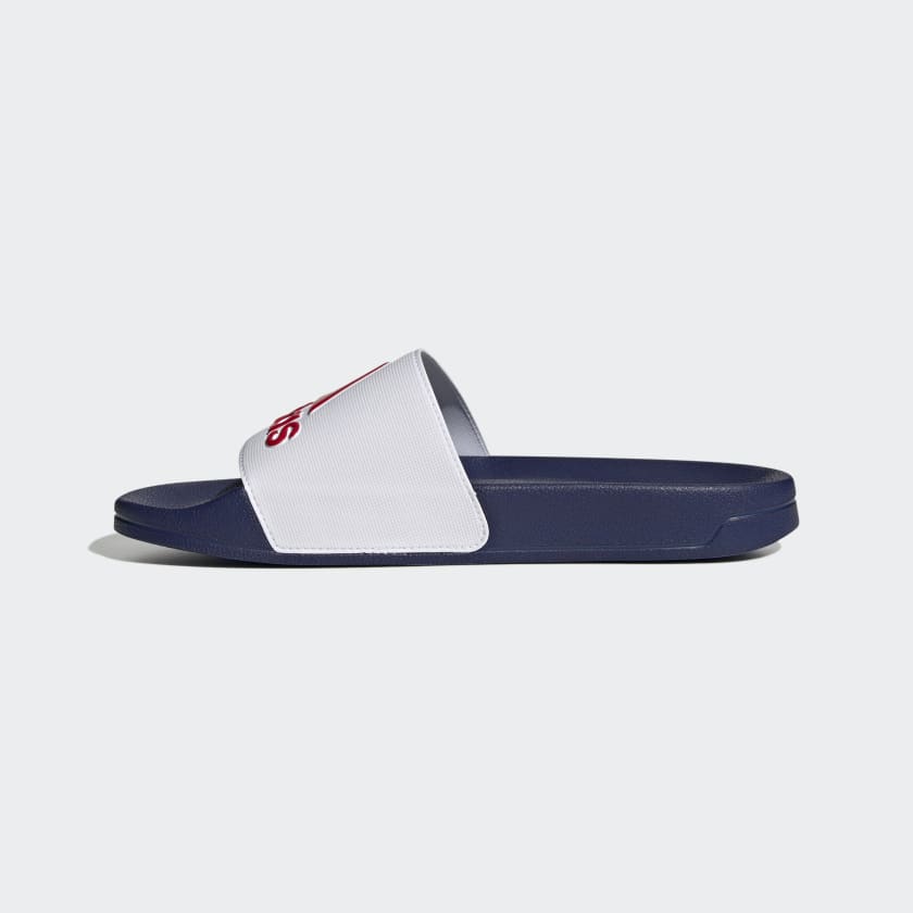 Adilette shower slides, navy base with white wide strap and red adidas logo