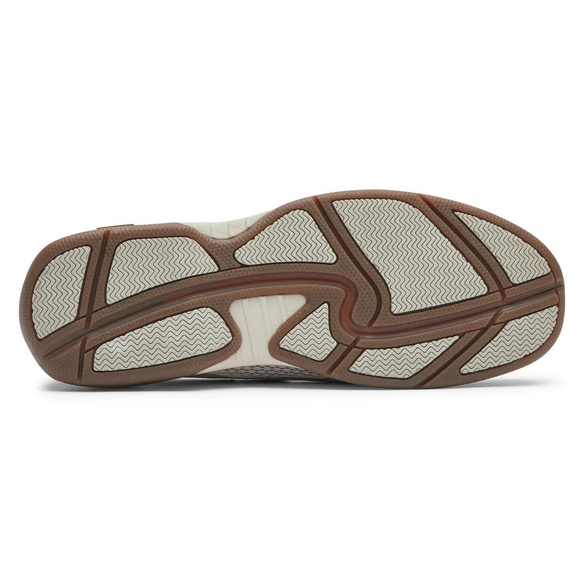 Beige boat shoe outsole with textured tread and geometric grip pattern