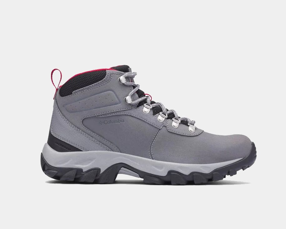 Light gray waterproof hiking boot with black laces and red lace pull accent