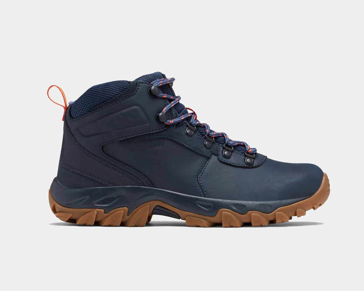 Navy waterproof hiking boot with orange lace accents and brown rubber outsole.