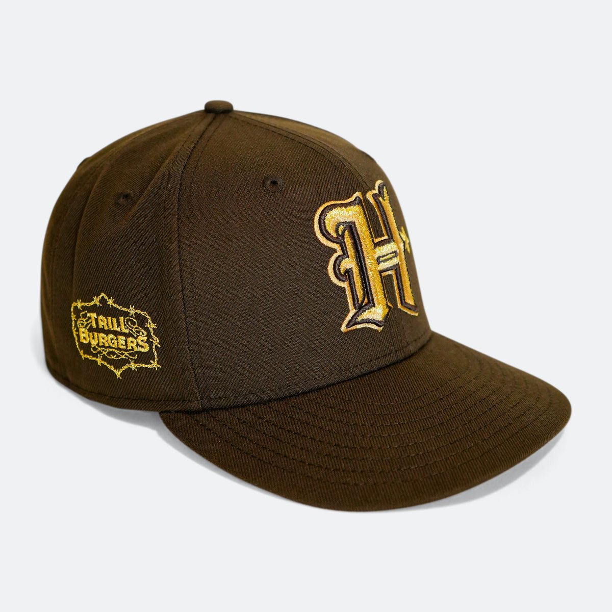 Brown 59Fifty cap with Trill Burgers patch and gold 'H' embroidery