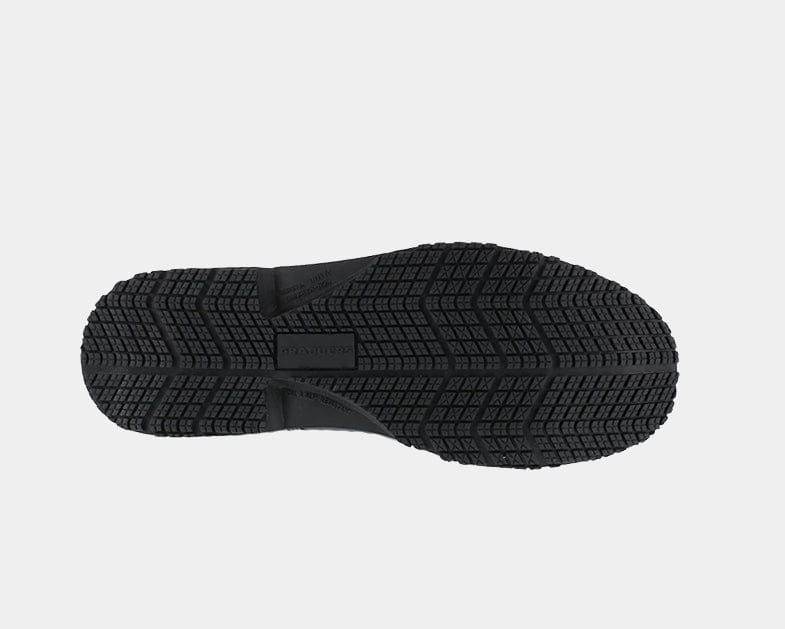 Black rubber outsole with deep tread pattern for grip