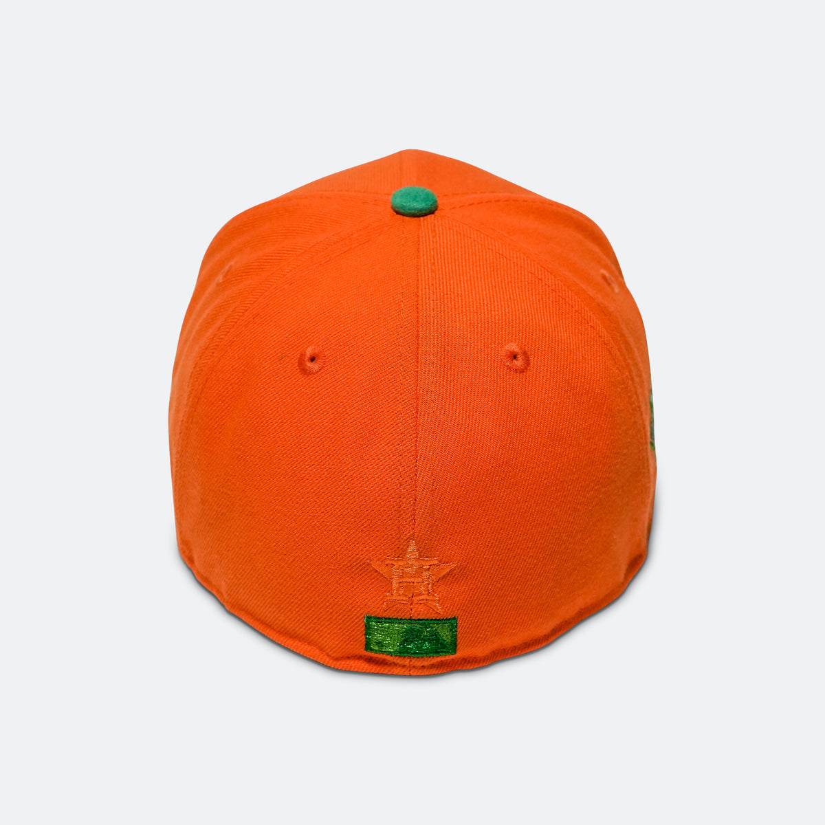 Orange baseball cap with green top button and small 'H' emblem, pink brim