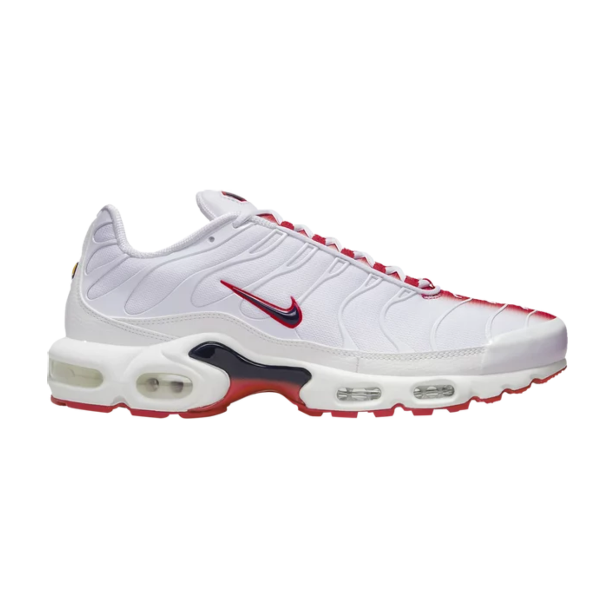 White Nike Air Max Plus sneakers with red laces and black side swoosh, visible air units