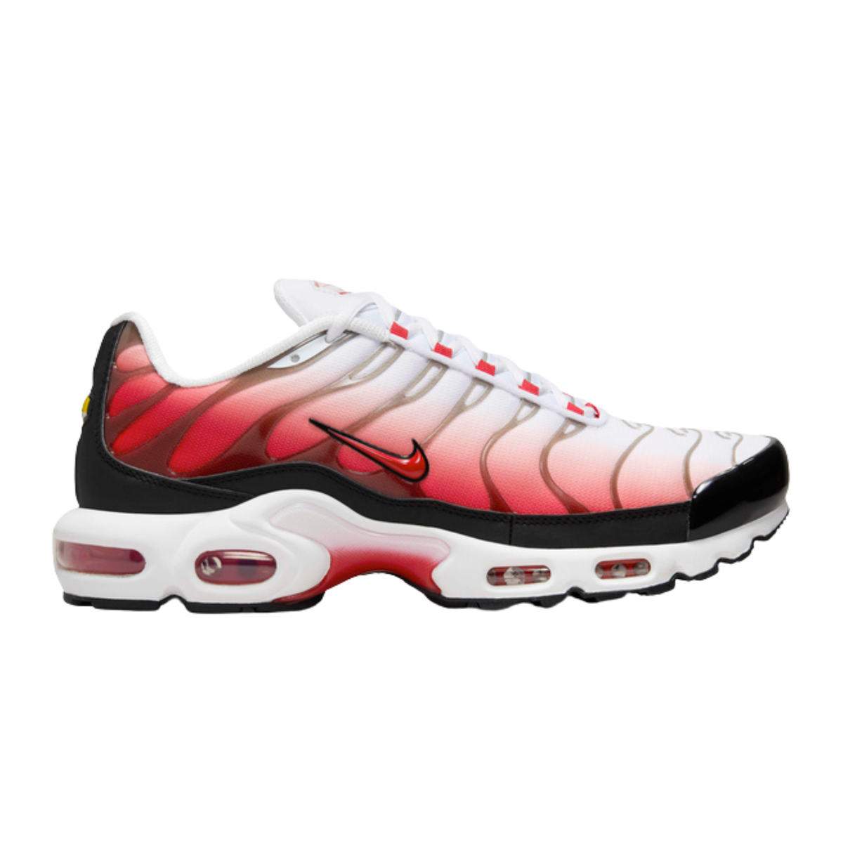 Nike Air Max Plus running shoe, white upper with black and red accents, side view