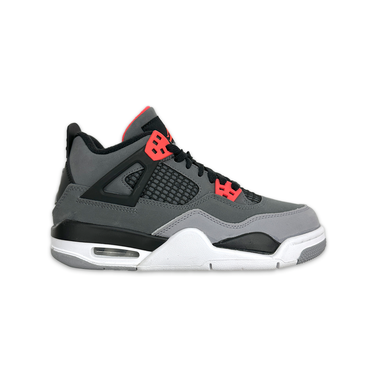 Kids' Air Jordan 4 Retro sneaker with dark gray upper, red accents, white midsole