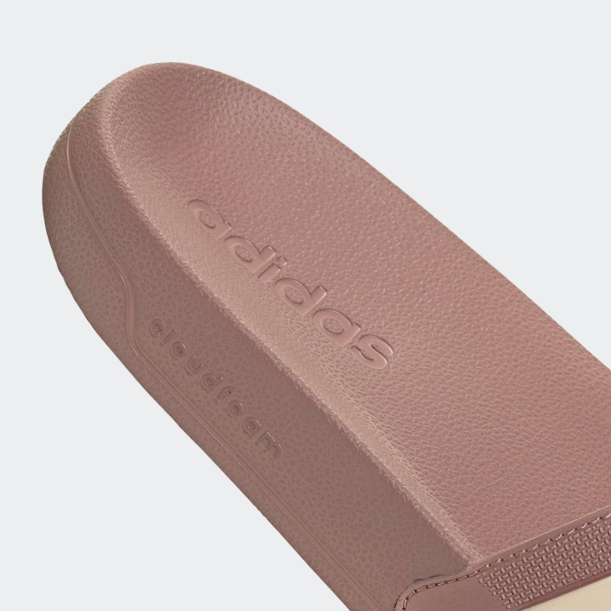 Adilette shower slides mauve footbed with embossed adidas and surface texture