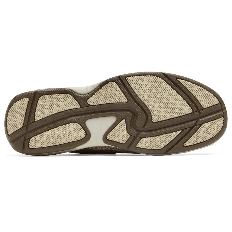 Brown boat shoe outsole with textured tread and gray rubber backing