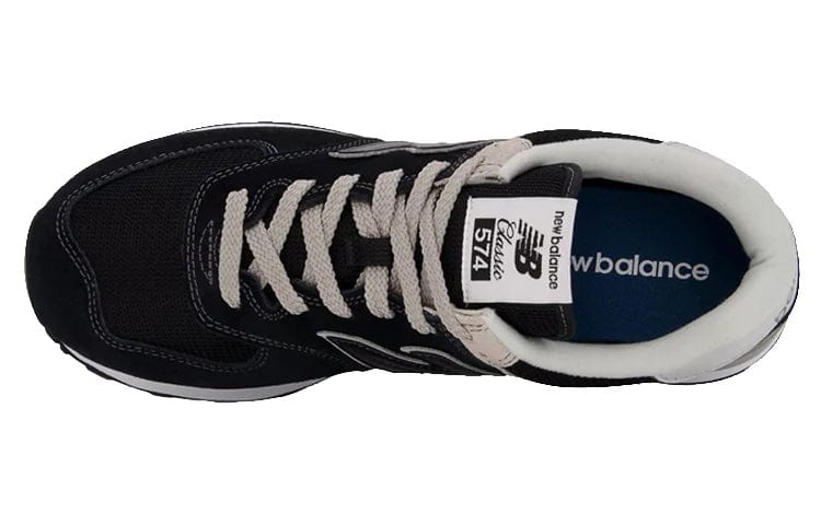 Black sneaker heel and inner lining showing 574 label on sockliner