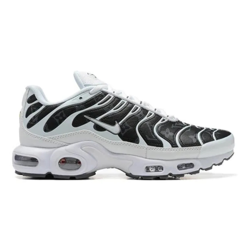 White and black athletic sneaker with wavy overlays and Nike swoosh