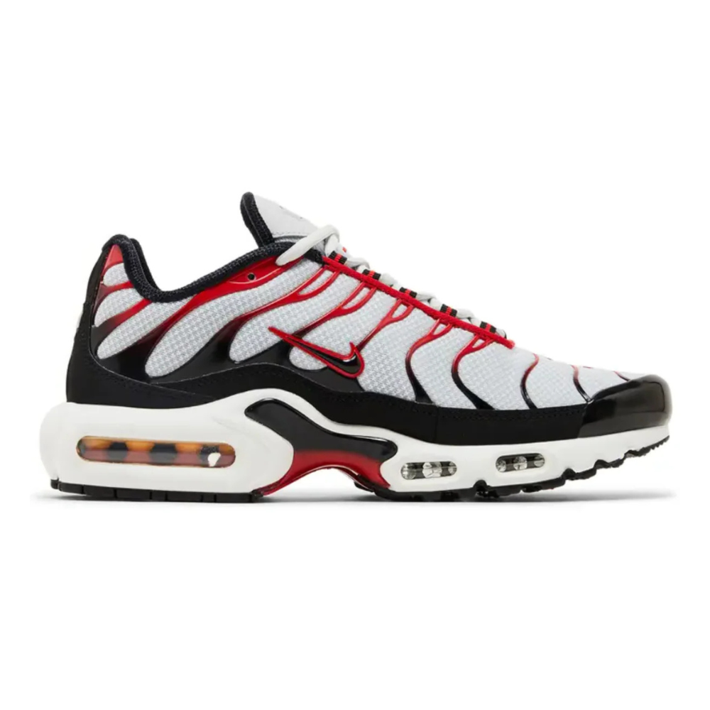 NIKE Air Max Plus sneaker in white, black, and red with visible Air cushioning