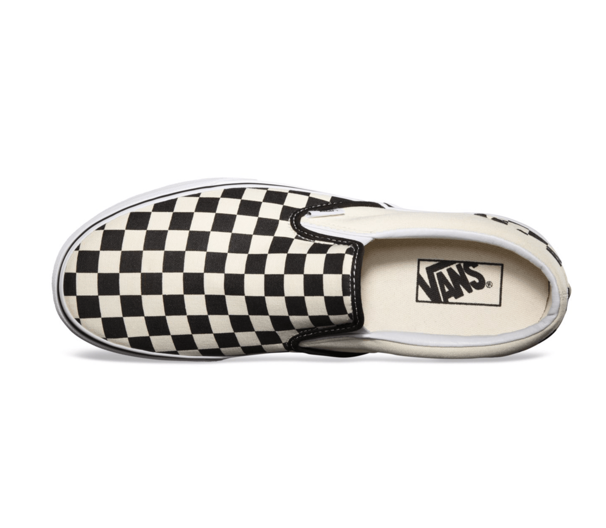Black-and-white checkerboard slip-on sneaker close-up of toe and Vans logo patch.