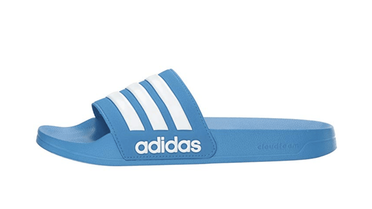 Blue Adilette shower slide sandals with adidas logo and white triple stripes