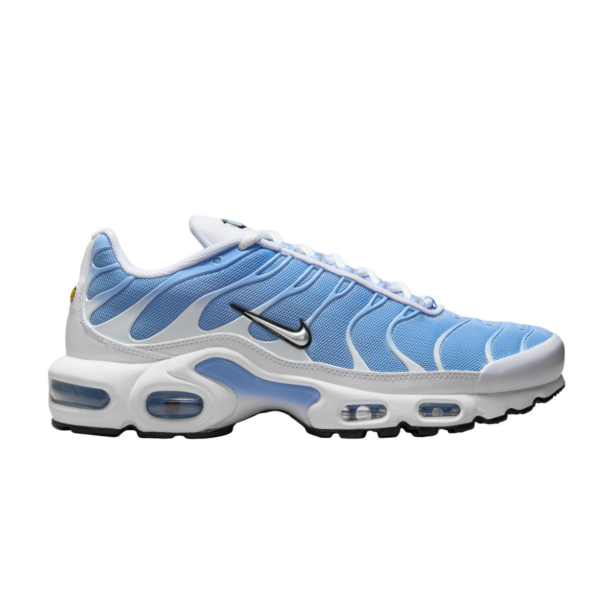 Light blue Nike TN Air Max Plus sneakers, black swoosh, white air sole